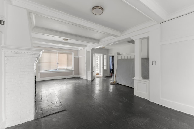 interior space with ornate columns, ornamental molding, dark wood-type flooring, and beam ceiling