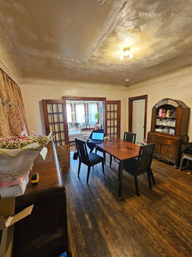 dining room with hardwood / wood-style flooring