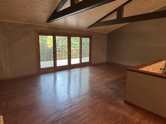 19084 200th Ave, Tustin, MI 49688 - unfurnished living room with wood finished floors and a textured wall