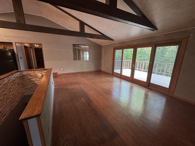19084 200th Ave, Tustin, MI 49688 - unfurnished living room with wood finished floors and french doors