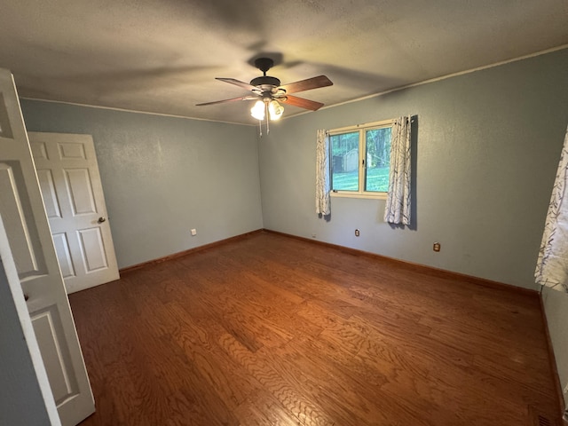 19084 200th Ave, Tustin, MI 49688 - unfurnished room with wood finished floors and a ceiling fan
