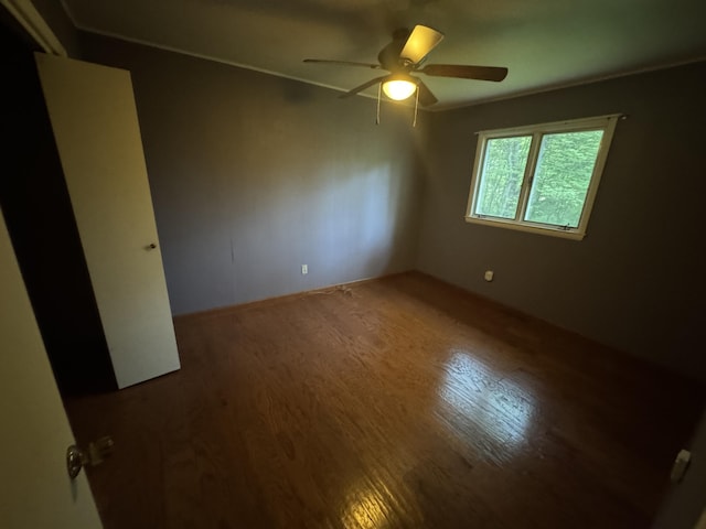 19084 200th Ave, Tustin, MI 49688 - spare room featuring a ceiling fan and wood finished floors