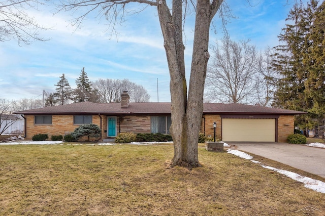 ranch-style house with concrete driveway, a chimney, an attached garage, a front lawn, and brick siding