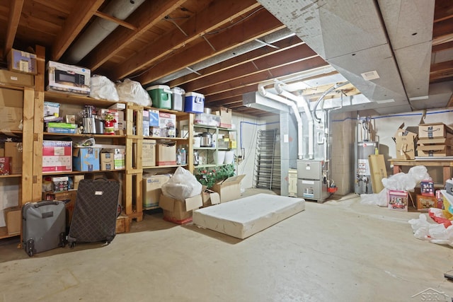 unfinished basement featuring gas water heater, heating unit, and stairs