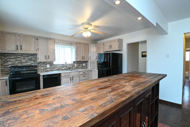 kitchen with a ceiling fan, wooden counters, a sink, black appliances, and tasteful backsplash