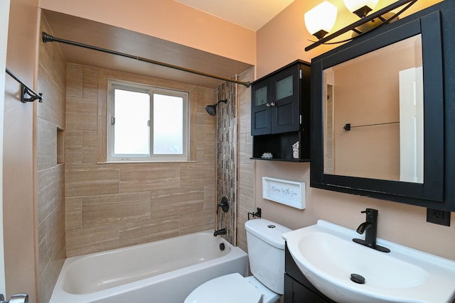 bathroom featuring shower / bath combination, toilet, and vanity