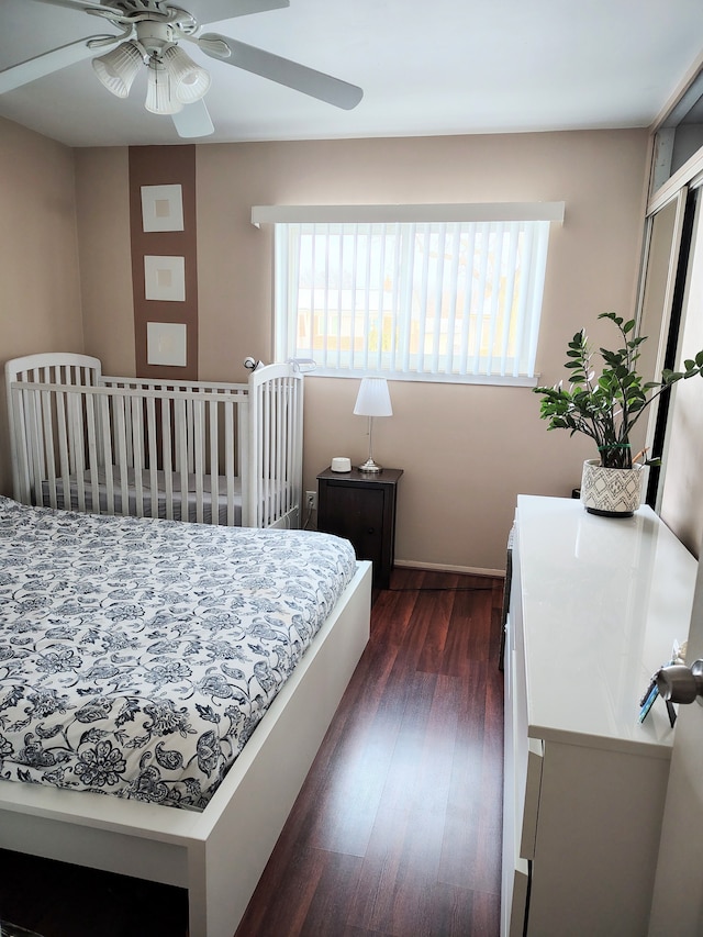 bedroom featuring dark wood-style floors