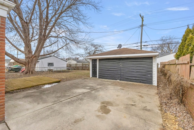 detached garage with fence