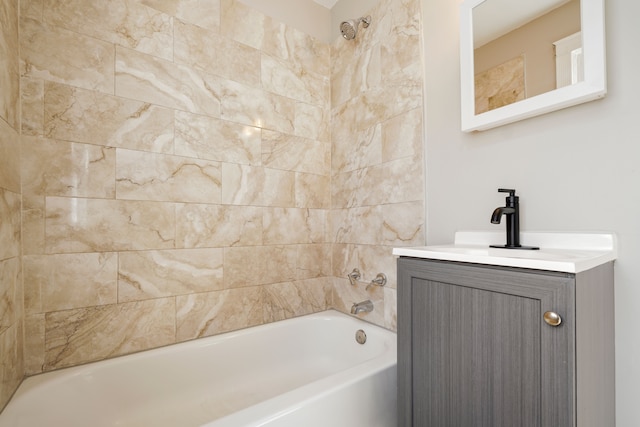 bathroom featuring shower / tub combination and vanity