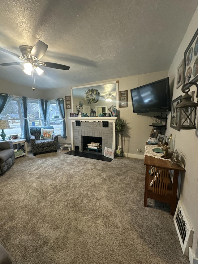 carpeted living room with visible vents, a ceiling fan, a brick fireplace, a textured ceiling, and baseboards