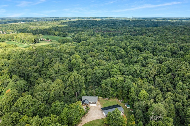 bird's eye view featuring a forest view