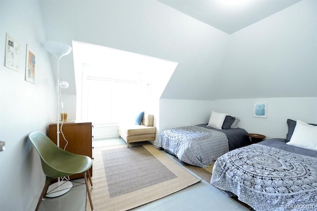 bedroom with vaulted ceiling