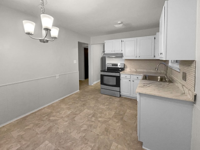 kitchen with white cabinets, stainless steel electric range, light countertops, and a sink