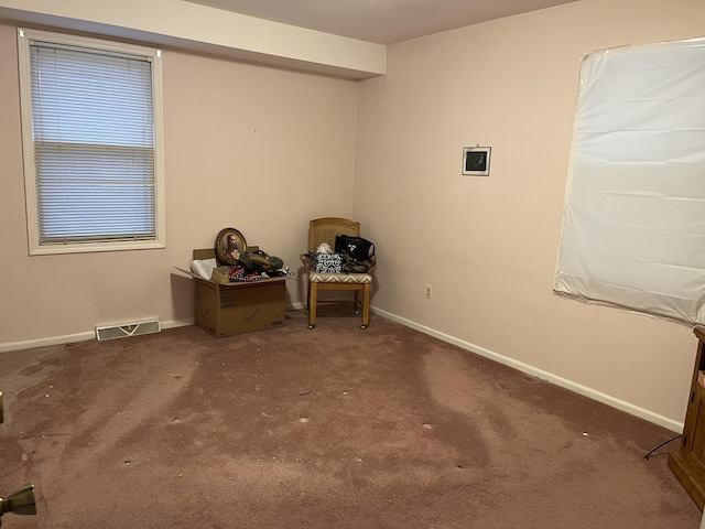 interior space with visible vents and baseboards