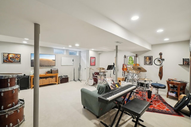 living room featuring carpet floors, visible vents, and recessed lighting