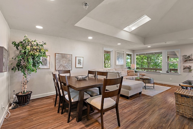 dining room featuring recessed lighting, wood finished floors, and baseboards