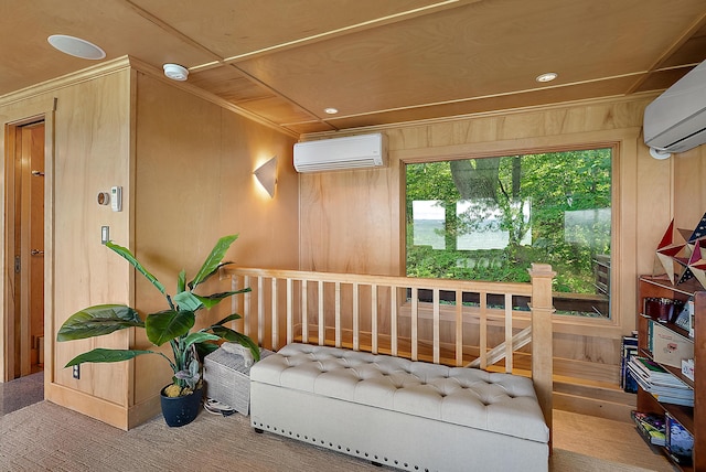 interior space featuring wood walls and a wall unit AC