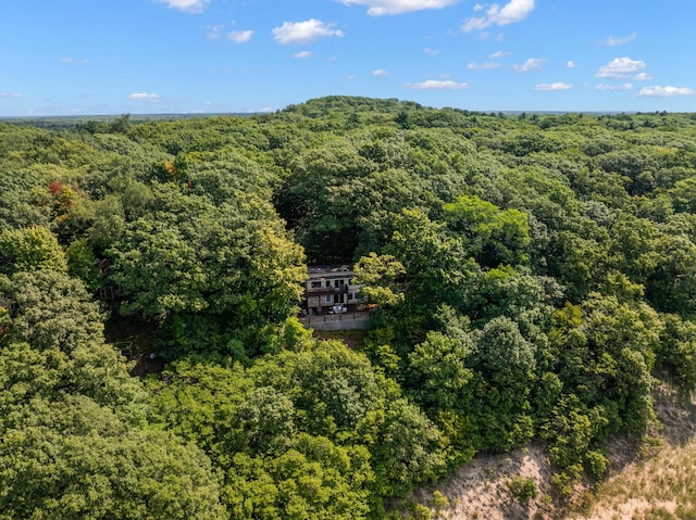 drone / aerial view with a view of trees