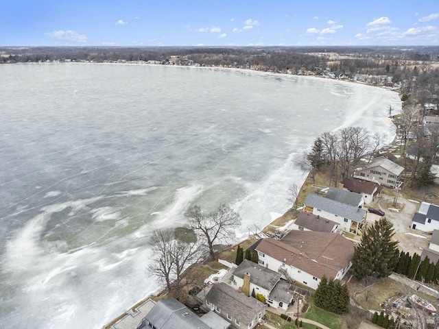 bird's eye view with a water view and a residential view