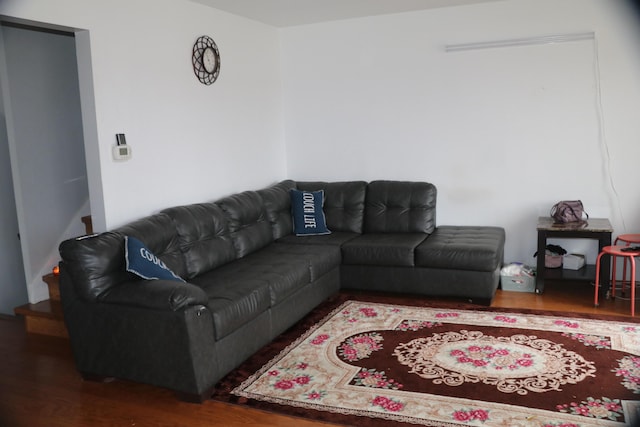 living room featuring stairway and wood finished floors