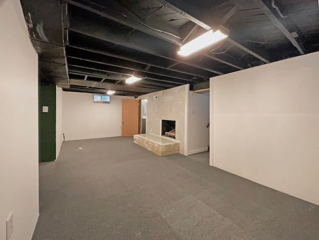 basement featuring a fireplace