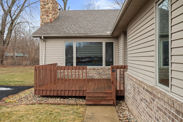 wooden deck with a yard