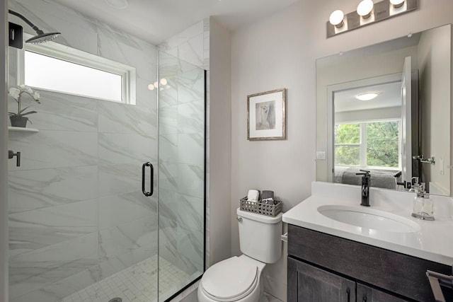 3628 Trumbull St Unit 11, Detroit, MI 48208 - bathroom with a shower stall, toilet, and vanity