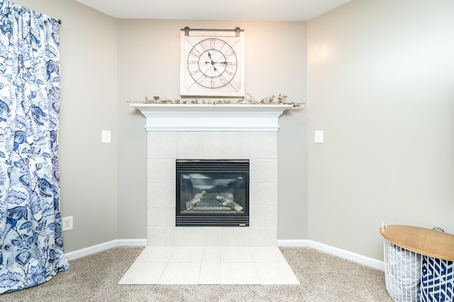 room details with carpet, a fireplace, and baseboards