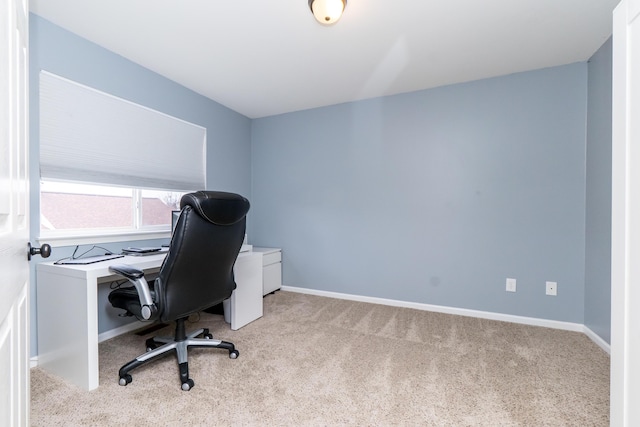 home office featuring carpet and baseboards