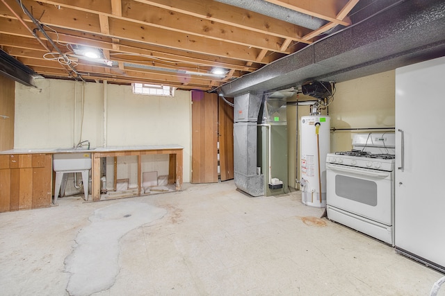 basement featuring gas water heater and heating unit