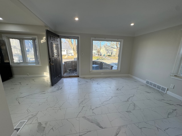 entrance foyer featuring recessed lighting, marble finish floor, visible vents, and baseboards