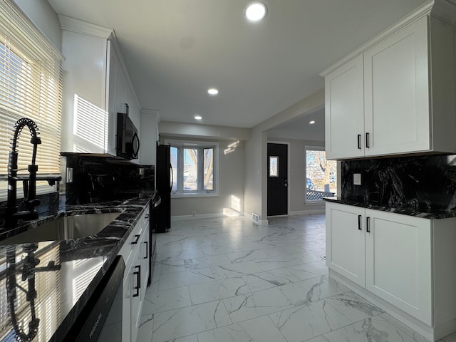 kitchen featuring marble finish floor, tasteful backsplash, recessed lighting, a sink, and black microwave