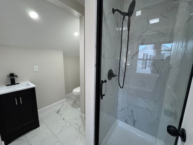 full bath featuring marble finish floor, baseboards, toilet, and a marble finish shower