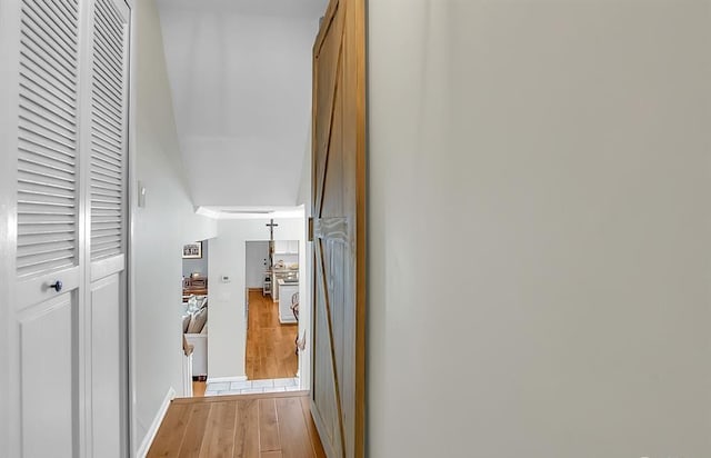 hallway featuring wood finished floors