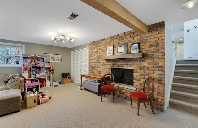 rec room with a fireplace, visible vents, carpet flooring, a chandelier, and beamed ceiling