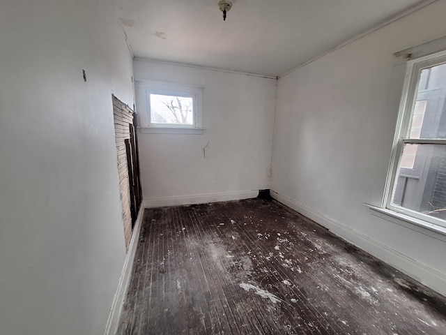 137 Elmhurst St, Highland Park, MI 48203 - spare room featuring wood-type flooring and baseboards