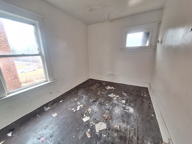 137 Elmhurst St, Highland Park, MI 48203 - unfurnished room with baseboards