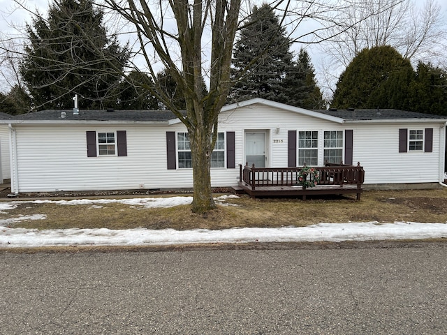 view of front of home featuring a wooden deck