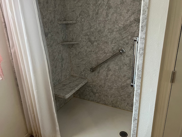 full bath featuring a stall shower