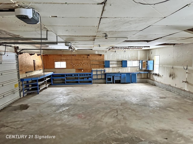 garage featuring a garage door opener