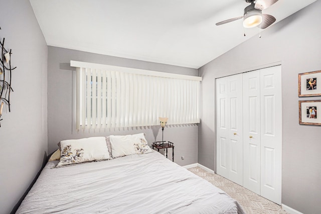 2159 Helmsford Dr, Wolverine Lake, MI 48390 - bedroom featuring baseboards, carpet flooring, a closet, vaulted ceiling, and a ceiling fan