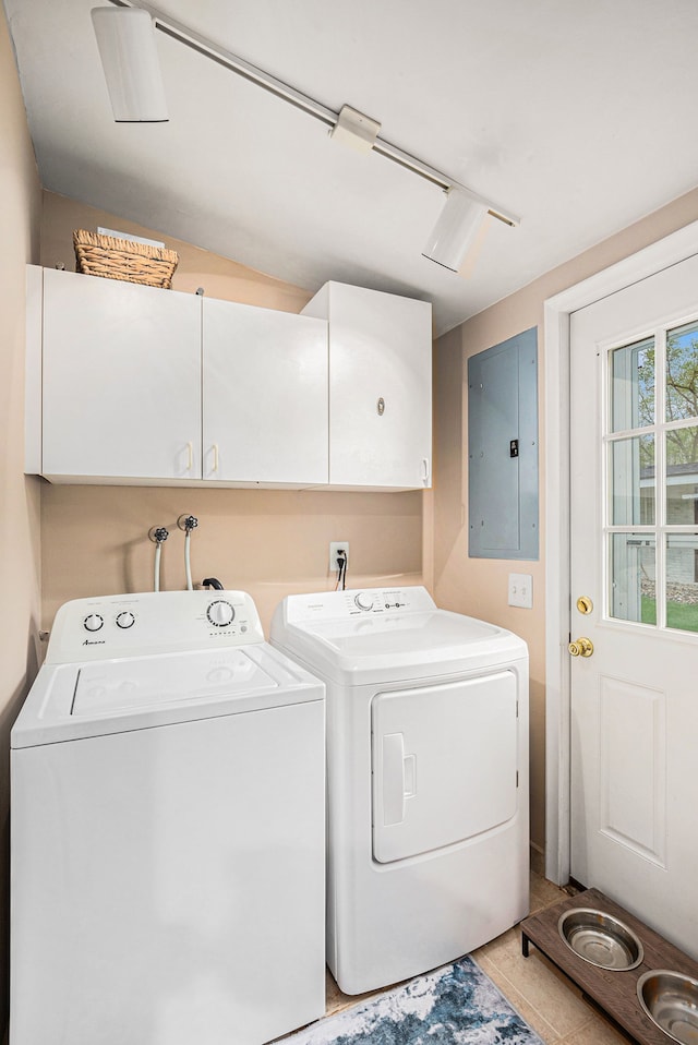 2159 Helmsford Dr, Wolverine Lake, MI 48390 - washroom with electric panel, cabinet space, separate washer and dryer, and light tile patterned floors