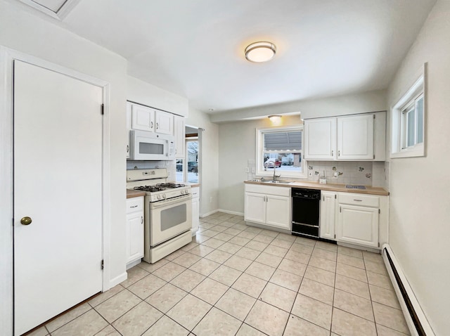 kitchen with light tile patterned floors, decorative backsplash, a baseboard heating unit, white cabinets, and white appliances