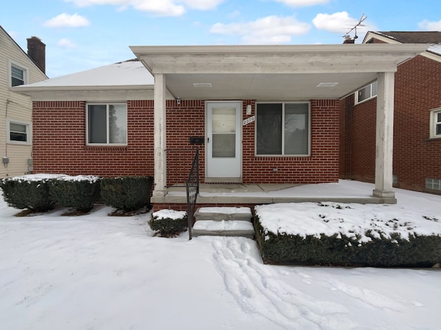 view of front of property with brick siding