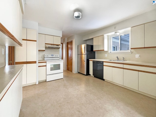 kitchen featuring white electric stove, dishwasher, freestanding refrigerator, under cabinet range hood, and a sink