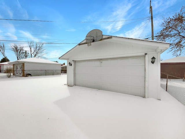 detached garage with fence