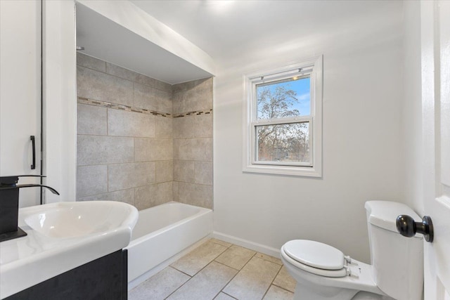 full bathroom with toilet, vanity, baseboards, shower / washtub combination, and tile patterned floors