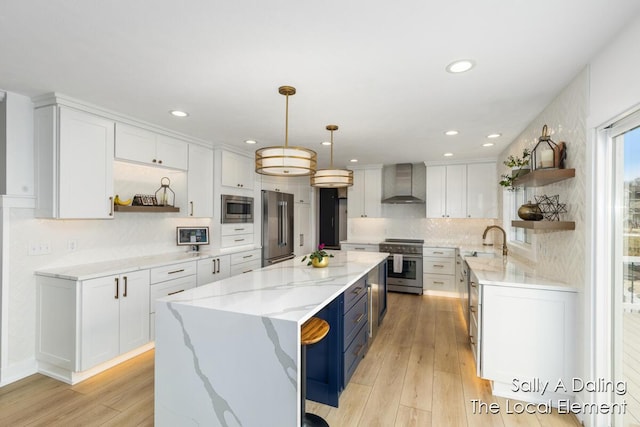 kitchen featuring open shelves, wall chimney exhaust hood, white cabinets, and high end appliances