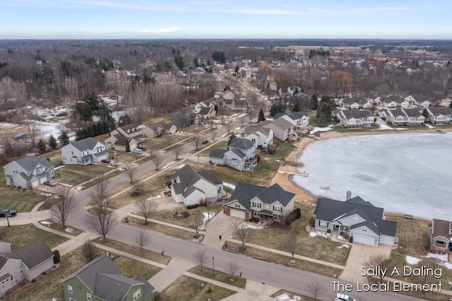 birds eye view of property with a residential view