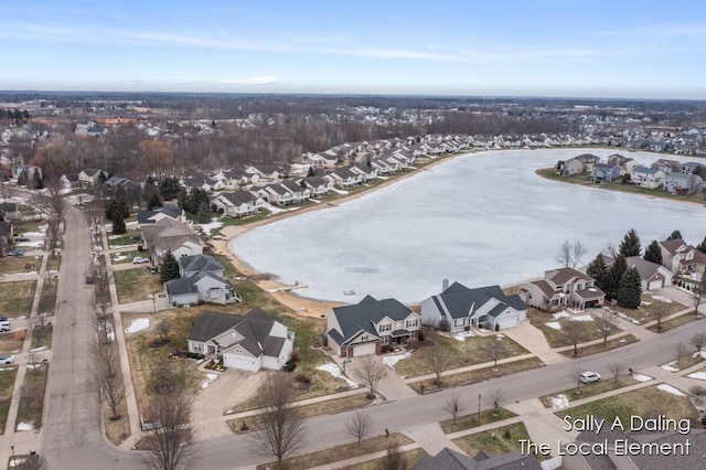 aerial view featuring a water view and a residential view